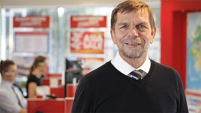 Graham Turner in Flight Centre office.