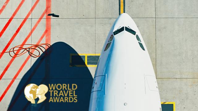 World Travel Awards logo with birds eye of plane nose.