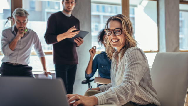 woman smiling in a group