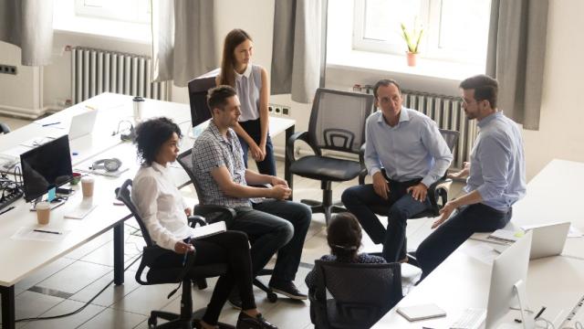 Team gathered round - FCM