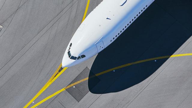 top view of aeroplane in the runway lane