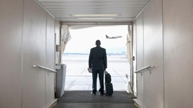 Traveler standing on jetway
