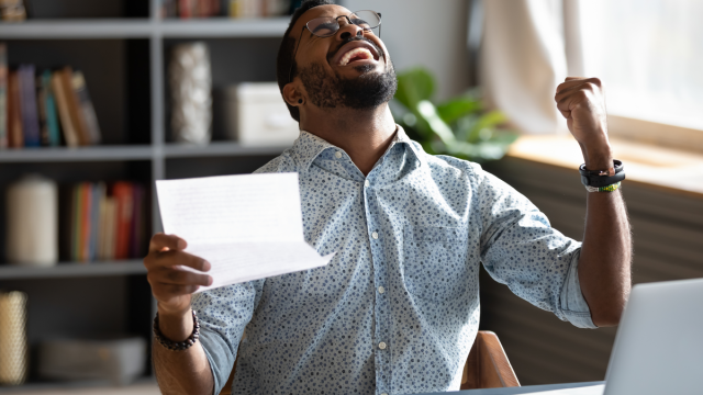man-celebrating-in-office