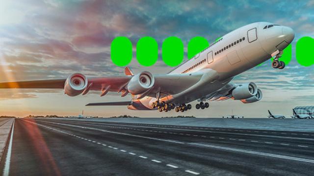 Plane taking off at dusk