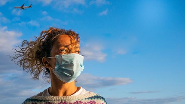 SUM Female wearing mask AECOMCSpage