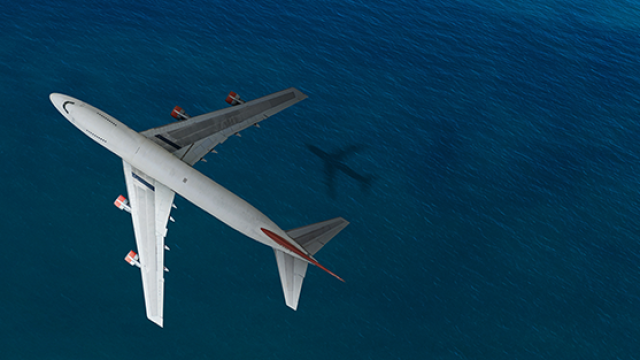 plane flying over water