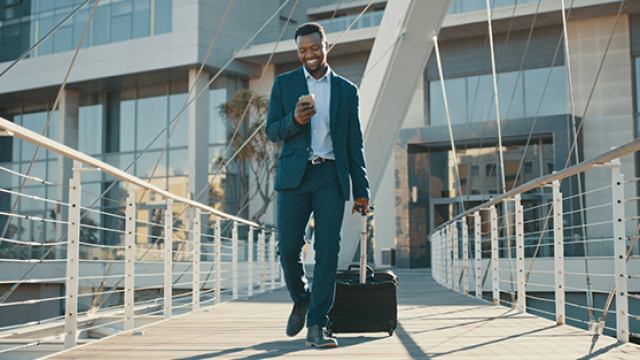 FCM, South Africa, Business Travel, Airport, Business Traveller, Black Man, Cellphone