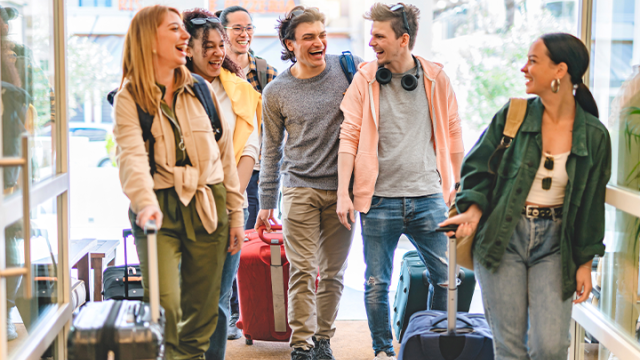 Group of people getting ready to travel to an event