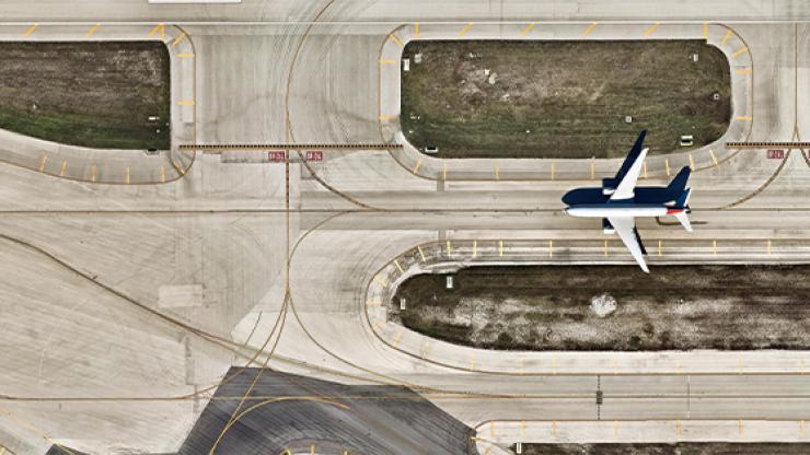 Birds eye view of plane on runway
