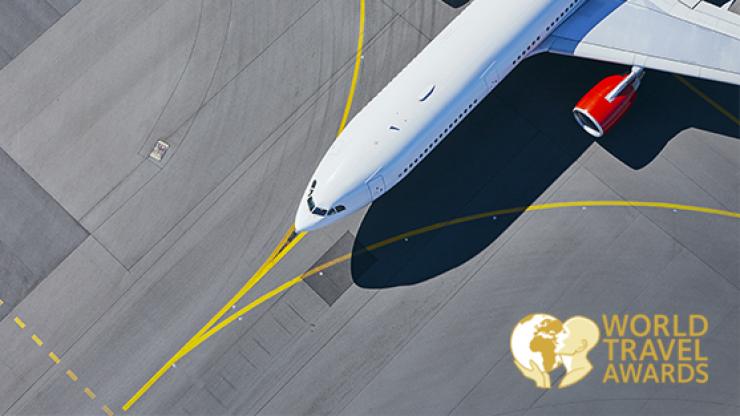 Aerial view of plane and World Travel Awards logo.