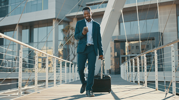 FCM, South Africa, Business Travel, Airport, Business Traveller, Black Man, Cellphone