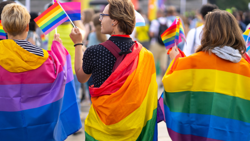 People with pride flag