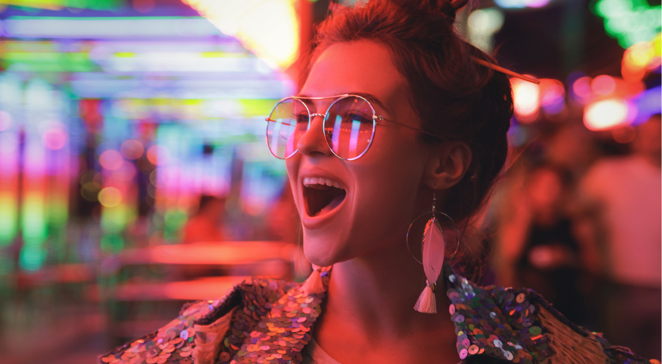 women laughing with red lighting effect