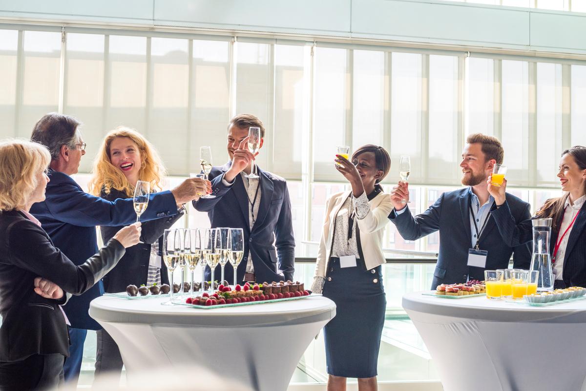 Group toasting at event