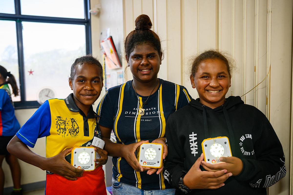 SolarBuddy - 3 girls holding solar project
