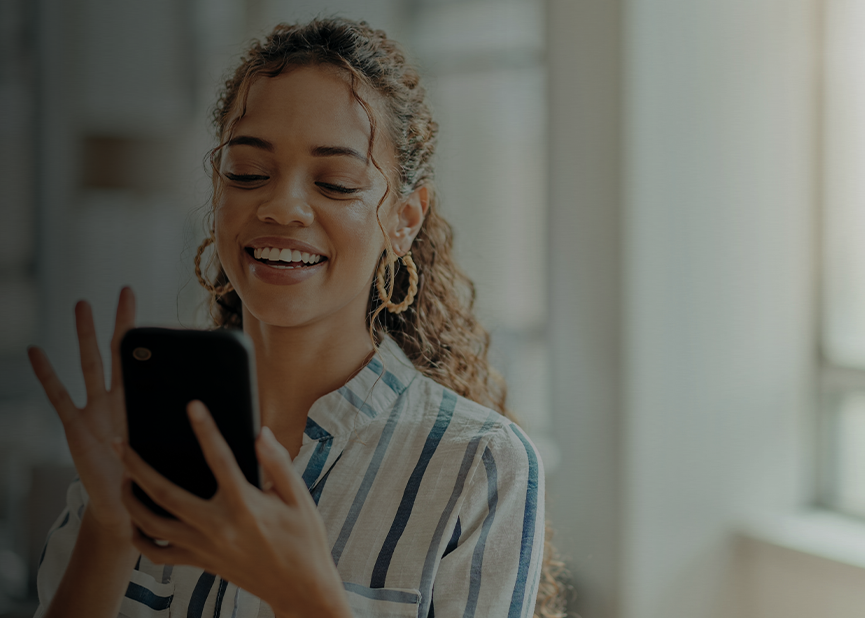 lady on her phone smiling