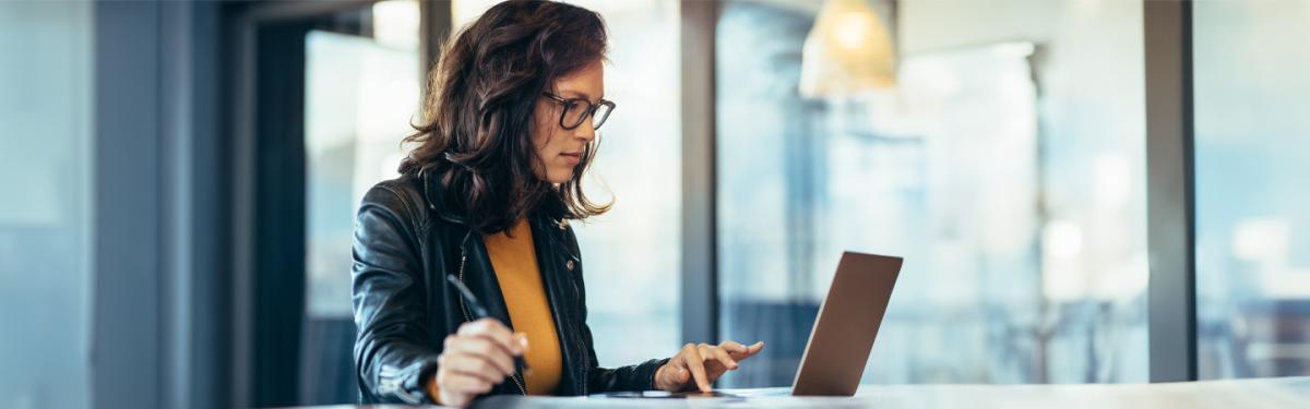 Woman working on her laptop.