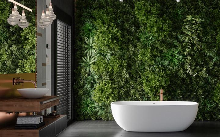 green wall with bath in sustainable hotel