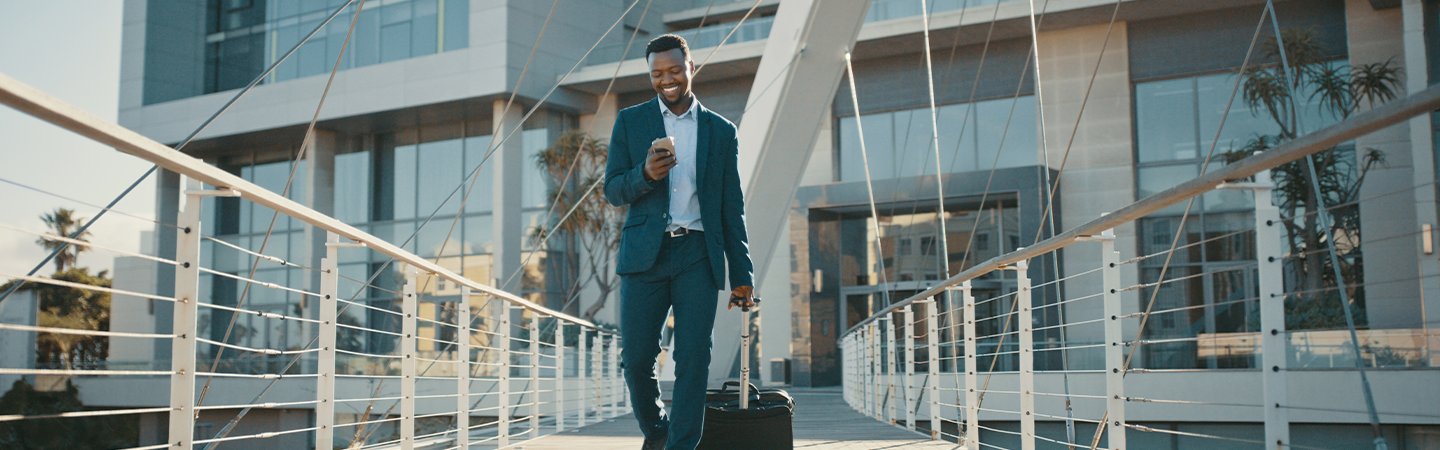 FCM, South Africa, Q4 Report, Business Travel, Airport, Luggage, Man on Cellphone