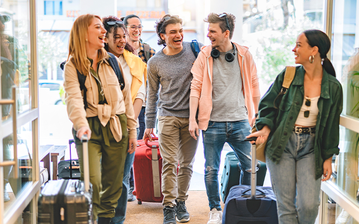Group of people getting ready to travel to an event