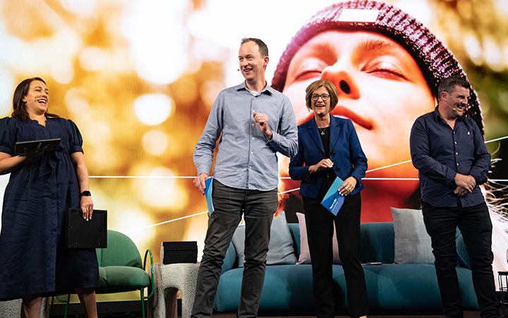 People on stage talking