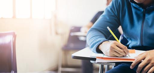 AU-FCM-Student in Class-HW.jpg