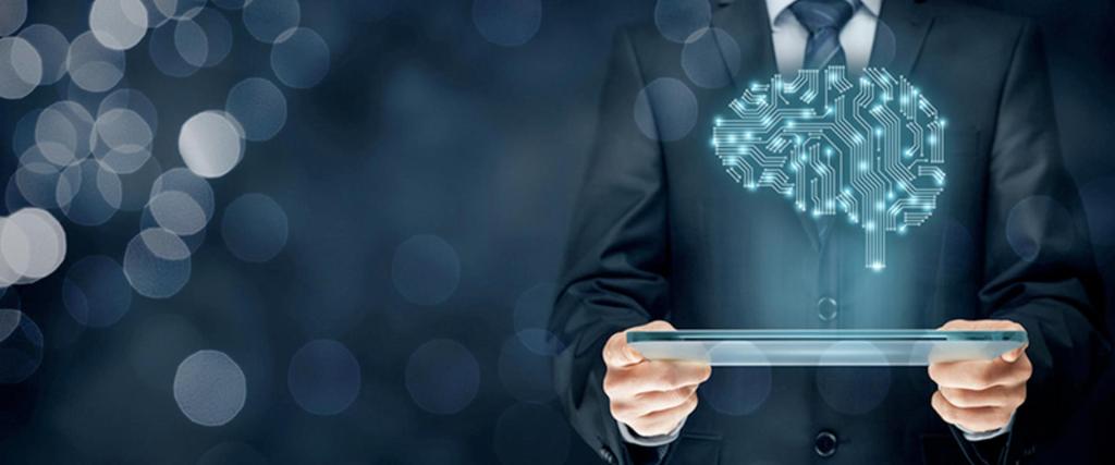 Man holding a tablet with artficial intelligence and science concept in brain shape