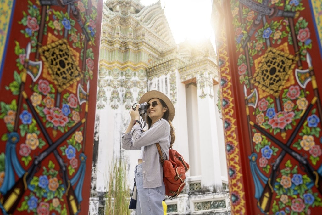 Asian female traveler enjoying view