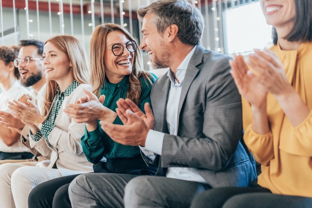 Business people applauding