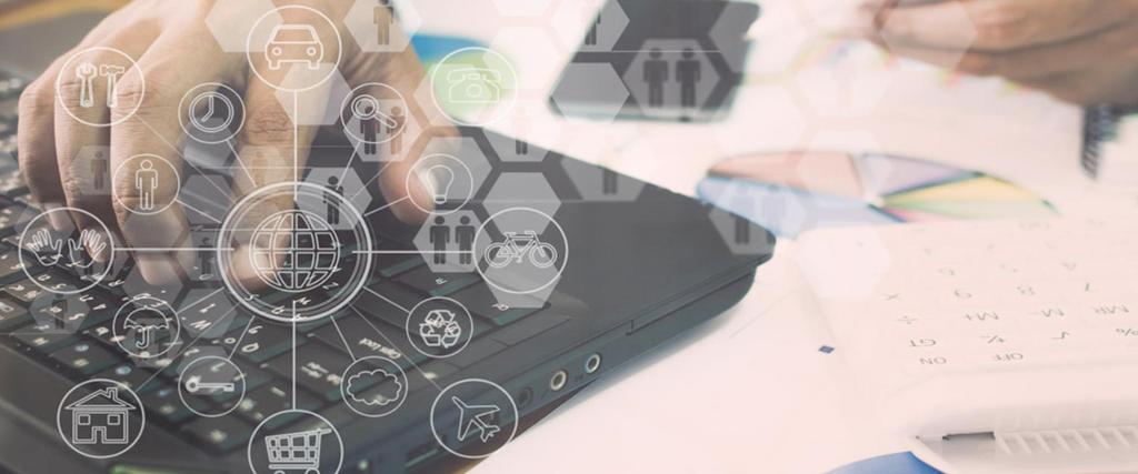 Zoomed in photo of hands on laptop keyboard typing