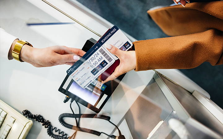 Handing airline ticket over