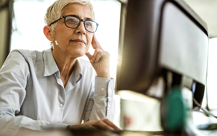 Woman looking at computer