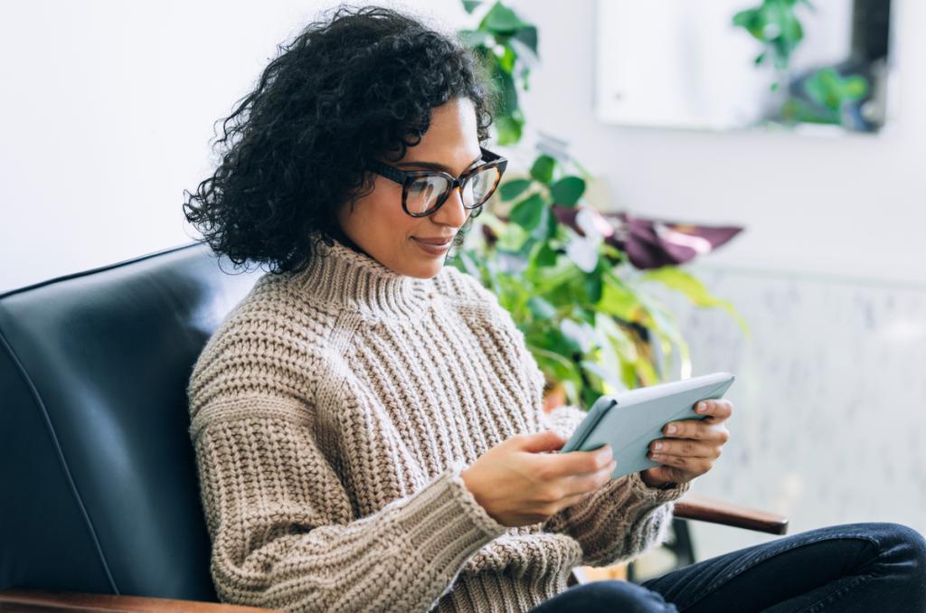 Woman reading tablet