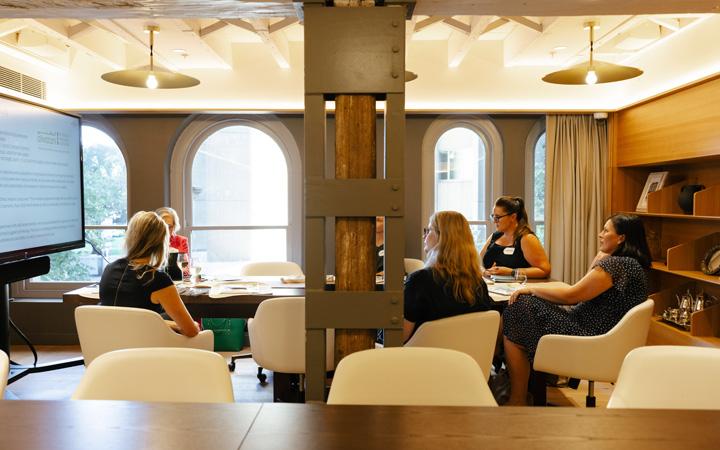 people sitting in discussion