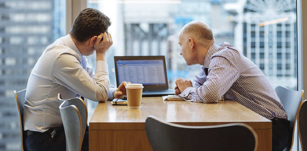 Men discussing RSA insurance