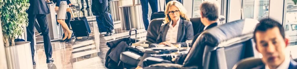 Business travellers in airport lounge