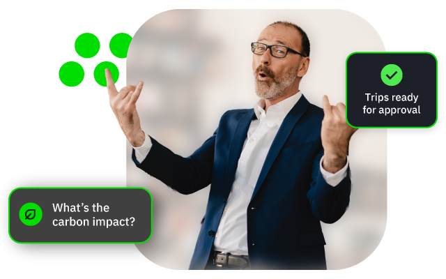 Photograph of businessman with green “What’s the carbon impact?” and “Trips ready for approval”