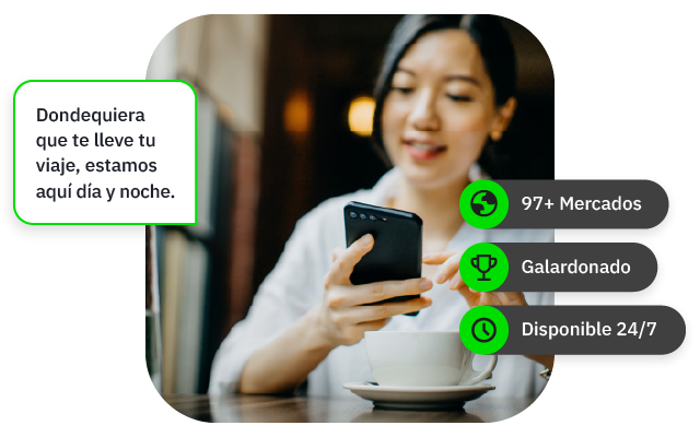 Women in a white shirt looking at her phone and the speech bubble says 'wherever your trip takes you, we're here day and night'