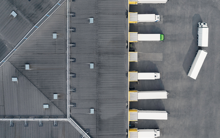 Birds eye view of trucks unloading