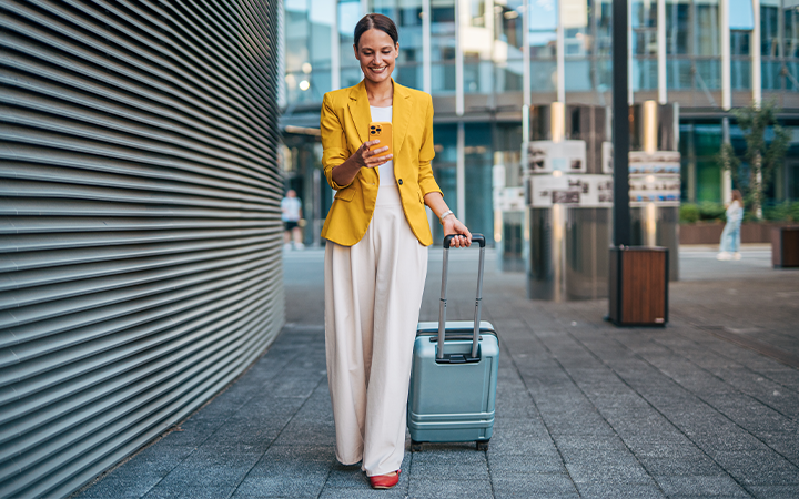 Lady on her phone carrying out a report