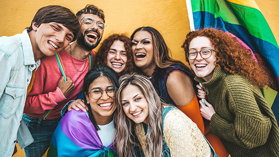 group-holding-pride-flag.png