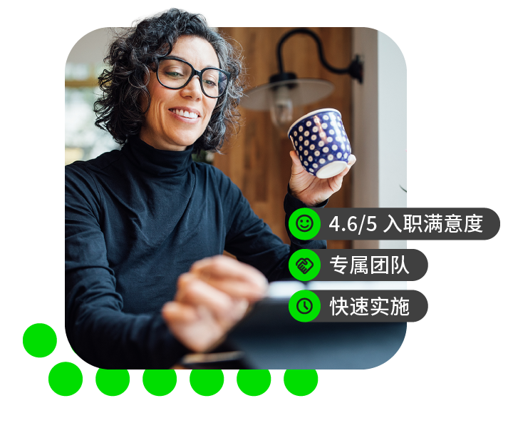 Woman with curly hair holds polka-dot mug and smiles at laptop, satisfaction checkmarks on right