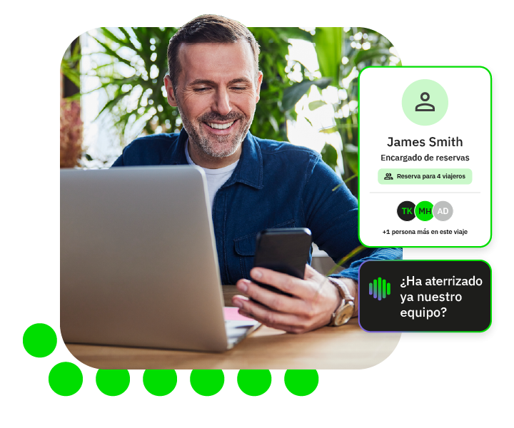 Man looking at his phone and messaging on the FCM platform 'has our team landed yet?'