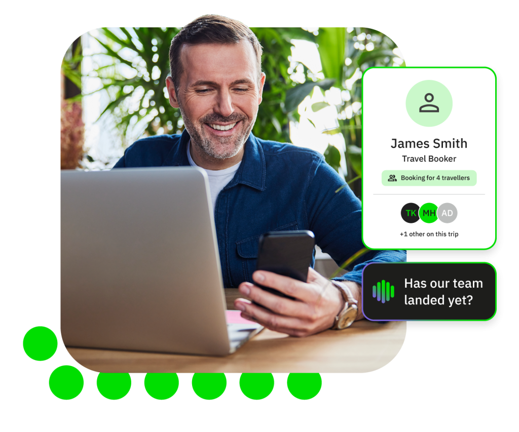 Businessman at desk with laptop and smartphone, chat bubble shows travel agent James Smith available.