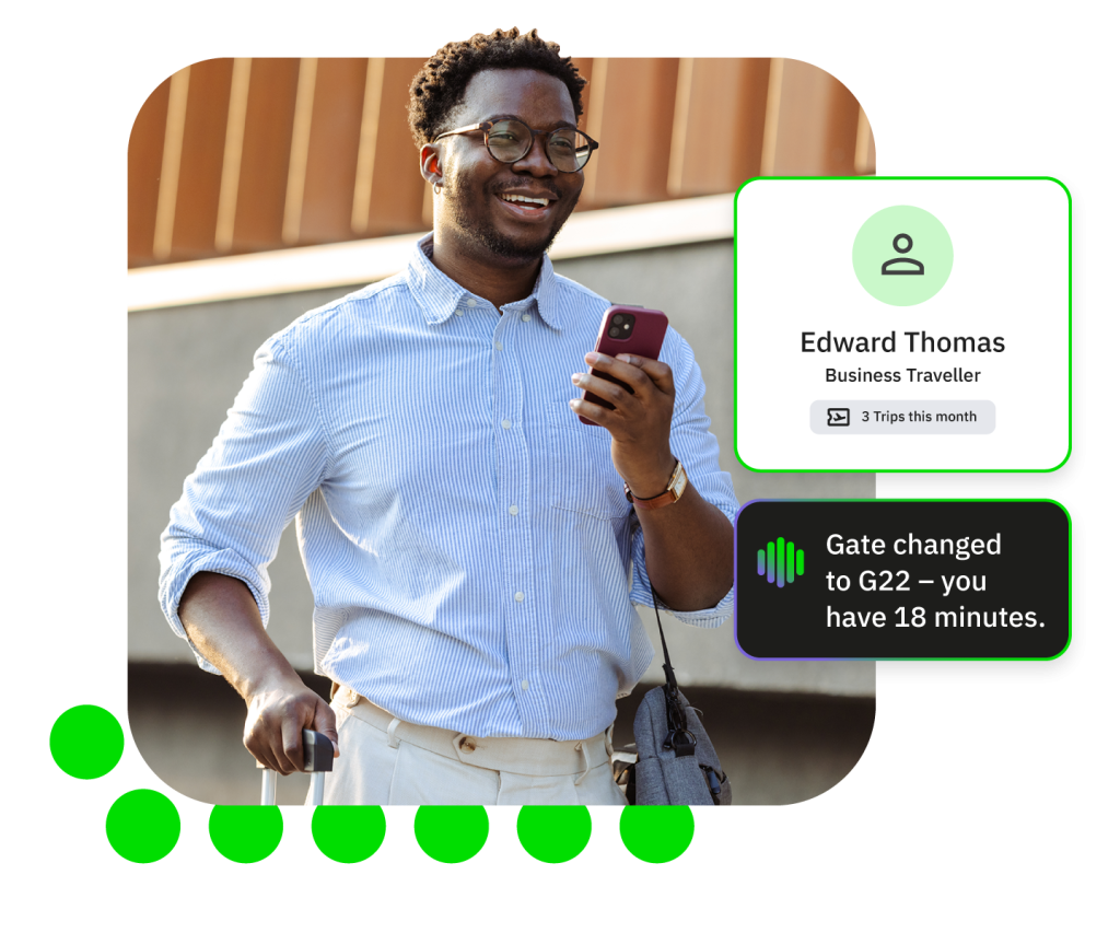 Smiling Black man holding phone and suitcase, digital overlay shows gate changed to G22