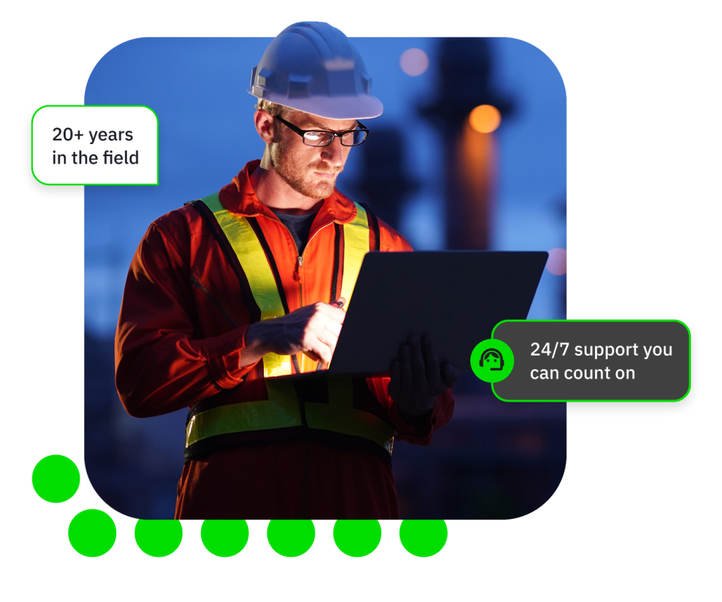 Worker in hard hat and vest using laptop, overlaid text '20+ years in the field' and '24/7 support'