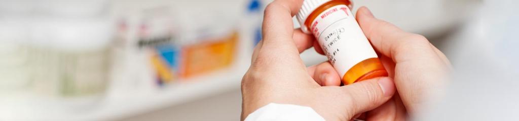 Pharmacist holding medicine