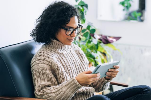 Woman reading tablet