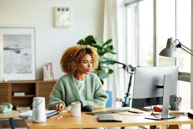 Woman working on desktop