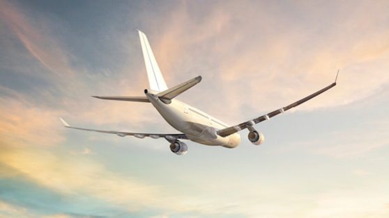 Airplane flying through the sky